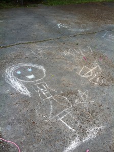 K's daughter's precious drawings on the driveway. The House provides stability for her while her mom gets things back in order.