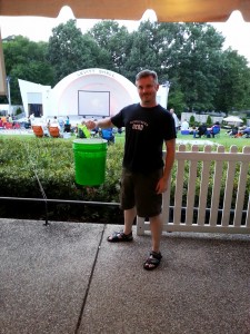 Michael Garcia with the donation bucket for Indie Memphis at the Levitt Shell.
