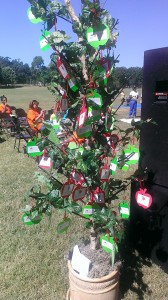 The tree is covered in cards that event goers can purchase to help the Food Bank fill backpacks for their program. The tree was displayed at their Miles for Meals event