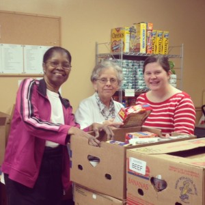Packing up a box a the Fig Tree Food Pantry with the help of Ms. Gloria and Ms. Mary - so much fun!