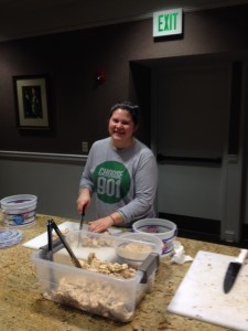 Dicing up some yummy cuts of chicken at the St. Mary's Soup Kitchen!