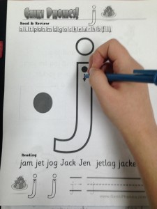 Learning to write the letter "J"