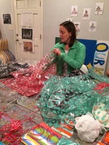 Stuffing gift bags for the CAG Christmas party