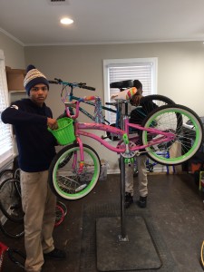 Two almost-graduates of the CAG bike mechanics program